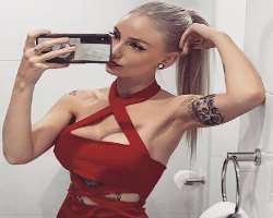 The star is a tattoo lover and has various tattoos on her hand, shoulders, back and belly. 
